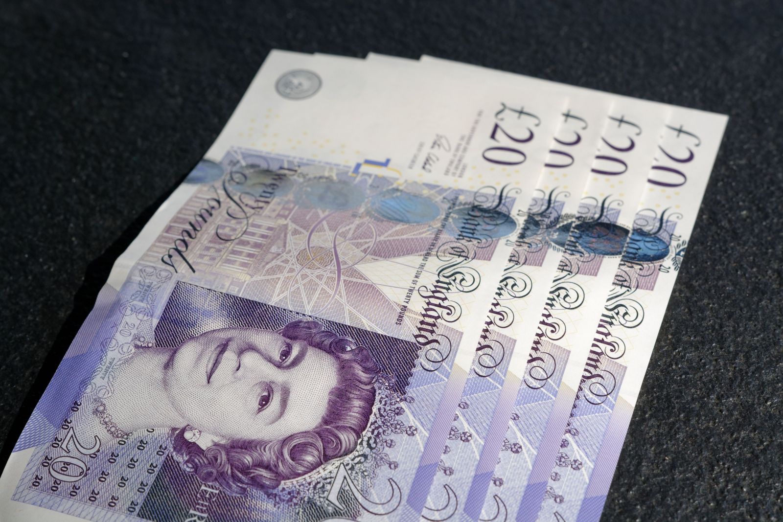 Bank of England cuts interest rate ahead of UK's new budget